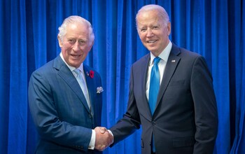 The then Prince of Wales greets Joe Biden ahead of their bilateral meeting during the Cop26 summit in 2021