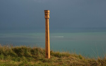 The pole is inscribed with the name Perkûnas, a Baltic deity