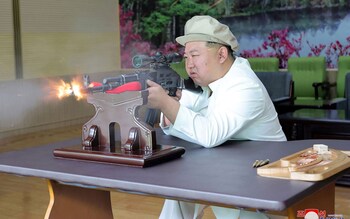 Kim Jong-un does his target practice in a decorated stately room