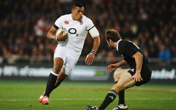 England's Luther Burrell charges forward during the International Test Match between New Zealand in 2014 - What it really feels like to just miss out on a World Cup squad